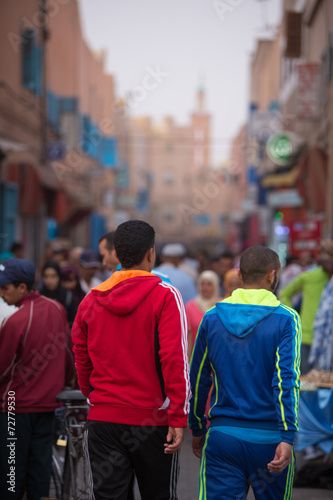 People walking and shopping in the old street of Tiznit, Morocco