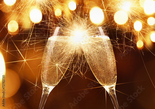 Glasses of champagne with sparklers