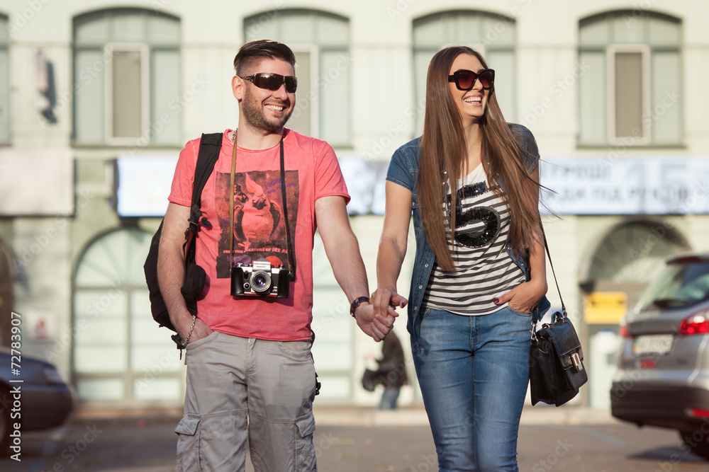 Happy tourists in town