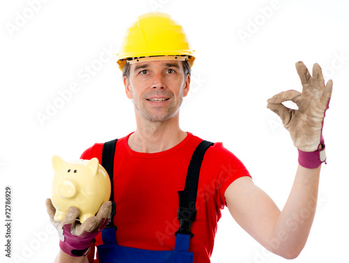 workman with piggy bank making agood job photo