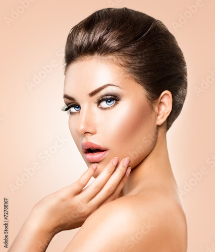 Beautiful Young Woman with Clean Fresh Skin closeup