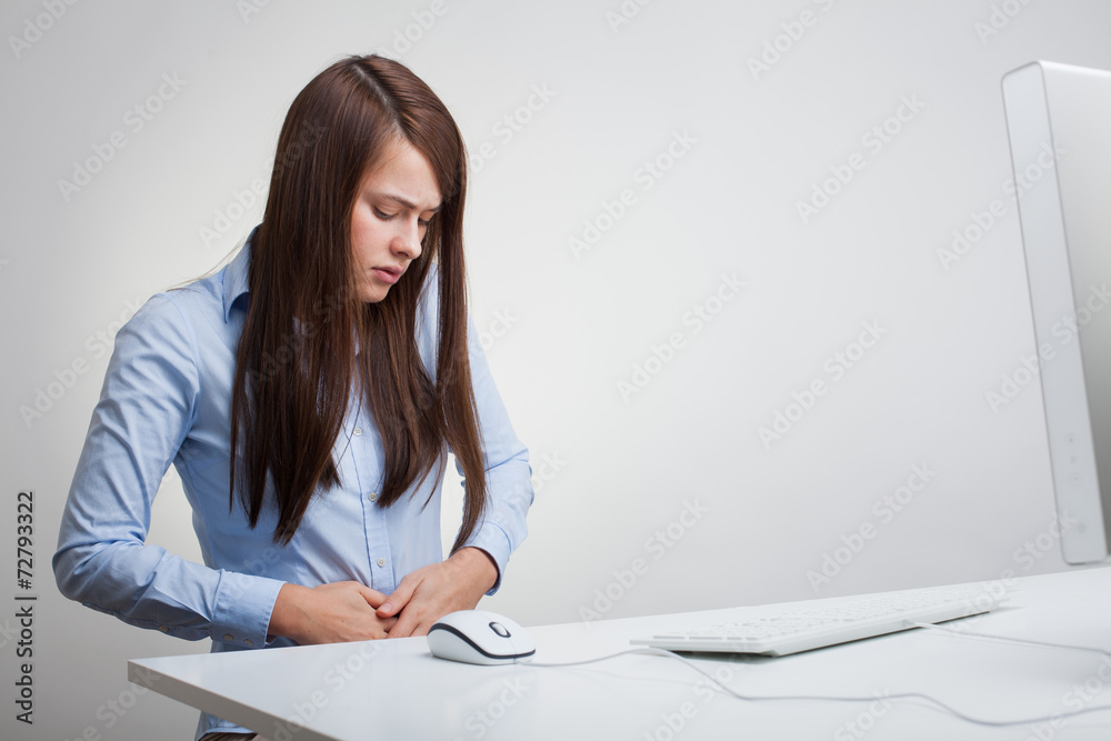 Woman massaging pain stomach Woman massaging pain stomach