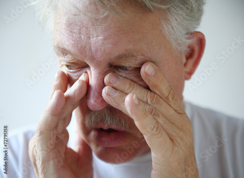Man has nasal congestion photo