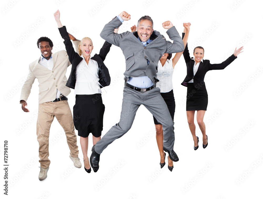 Successful Business Team With Arms Raised Over White Background