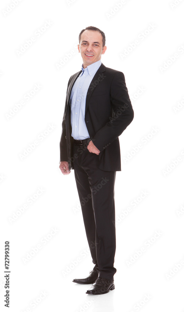 Full Length Portrait Of Happy Mature Businessman