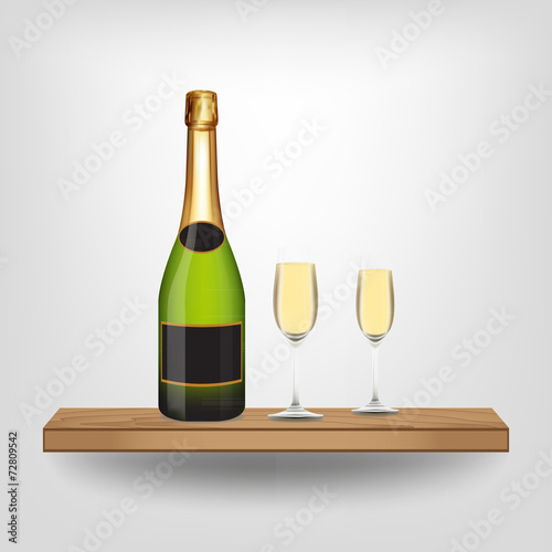 Champagne bottle and glass on wood shelf