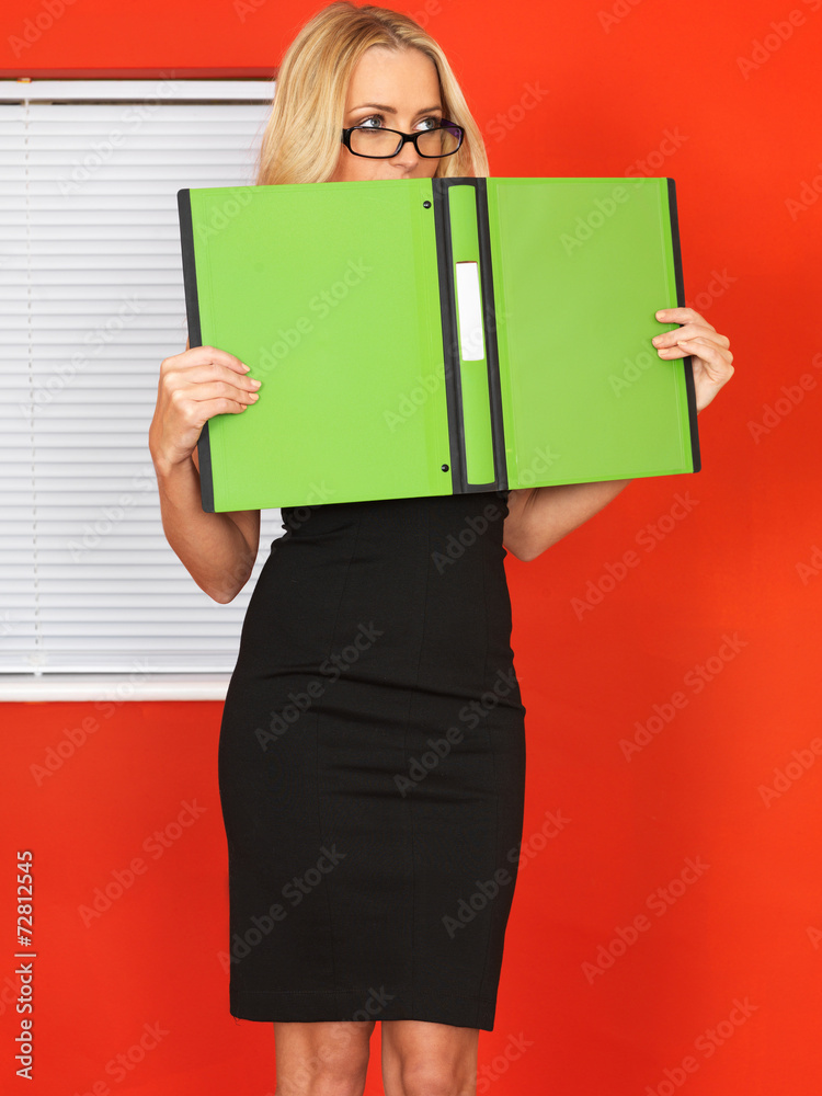 Young Office Worker Holding Businness Files Young Office Worker Holding Businness Files