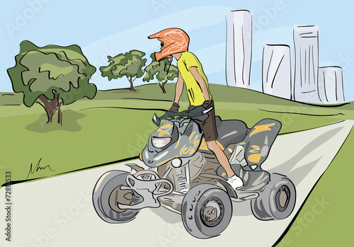 boy driving quad at the park