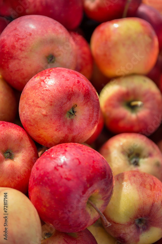 bunch of red and green apples closeup as a background