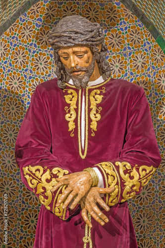 Seville - tradicional vested Jesus Christ statue in bond