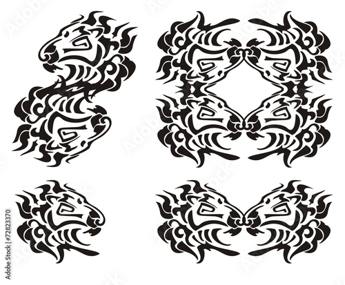 Tribal lion head symbols. Black on the white