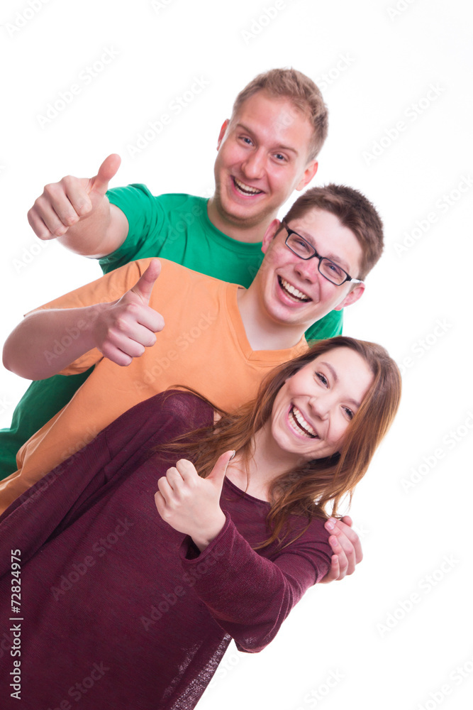 Three Friends with Tumbs Up and Smiling Three Friends with Tumbs Up and Smiling
