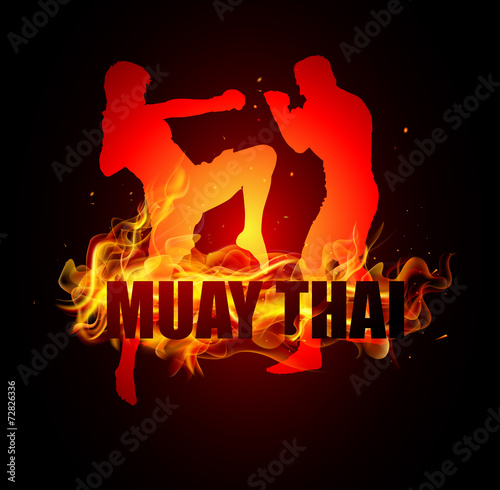 Thai boxer standing with knee postures on fire muay thai typo photo