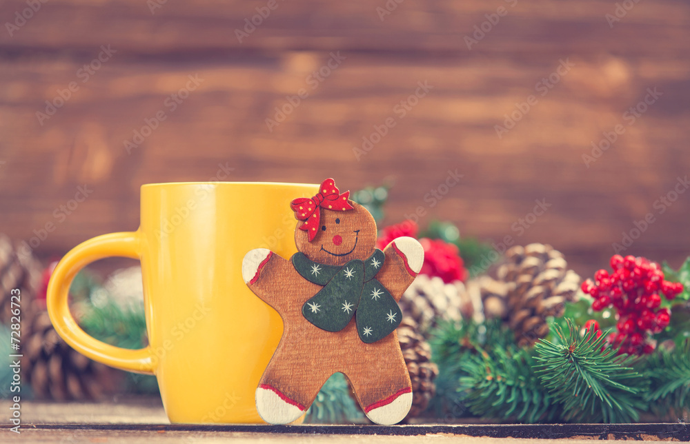 Toy gingerbread and cup of coffee