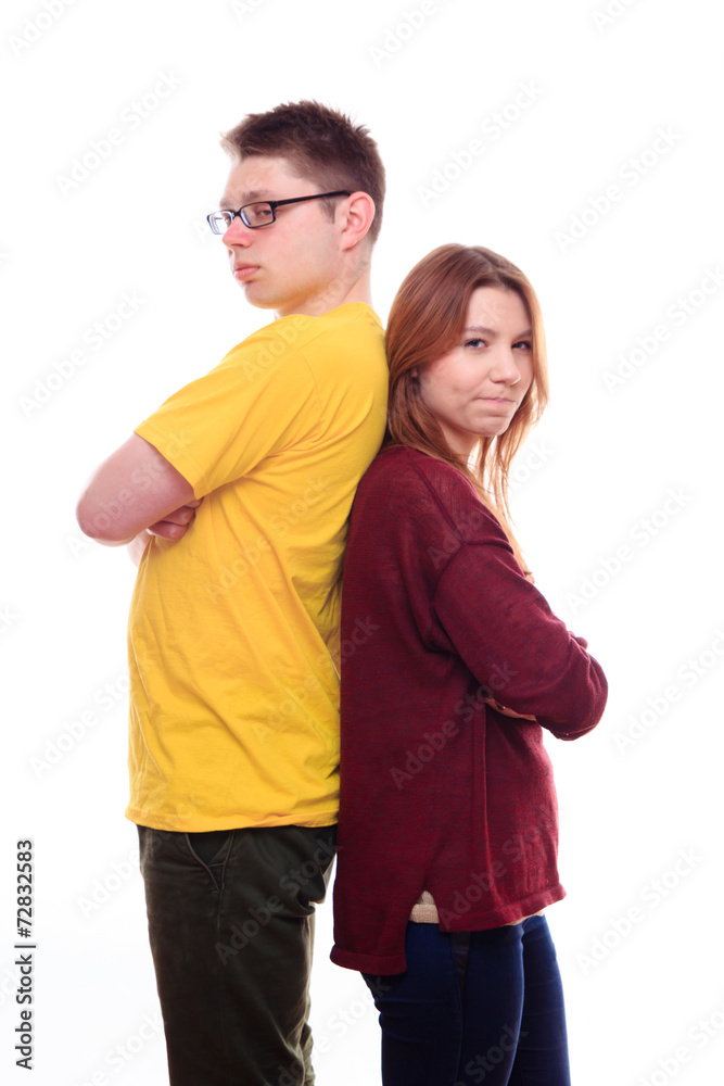 Young Boy and Girl Stand Back to Back Young Boy and Girl Stand Back to Back