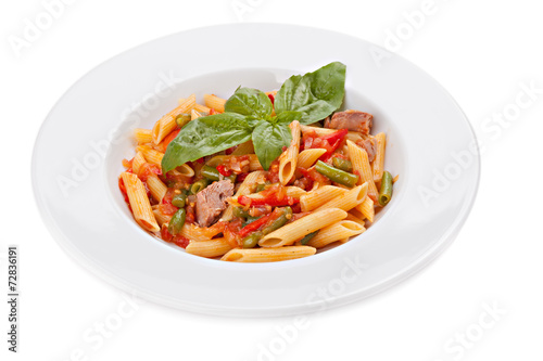 Italian pasta with stewed vegetables in bowl, isolated on white