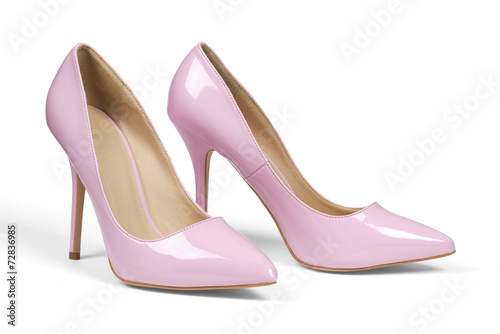 A pair of pink women's heel shoes isolated with clipping path.