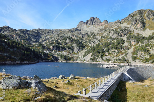 Artificial lake with a dam in the Haut-Pyrenees