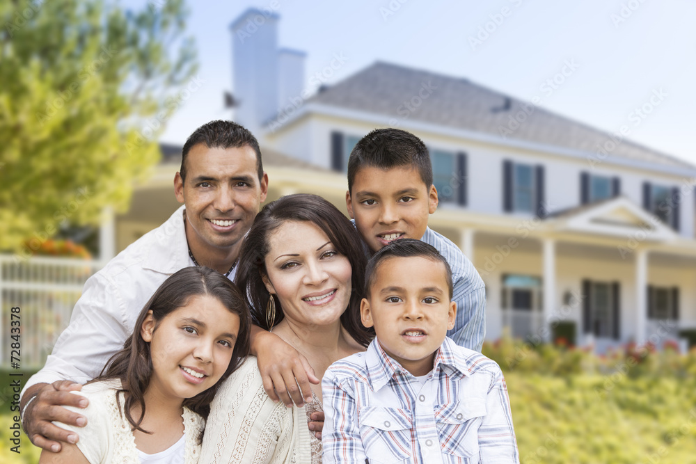 Hispanic Family in Front of Beautiful House Hispanic Family in Front of Beautiful House
