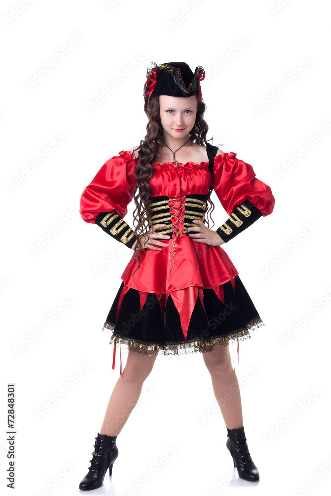Lovely girl posing in pirate costume on Halloween Lovely girl posing in pirate costume on Halloween