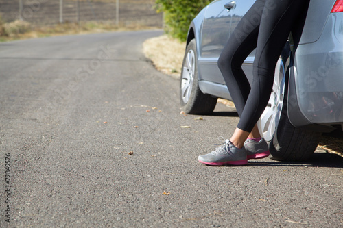 Legs close up near the car