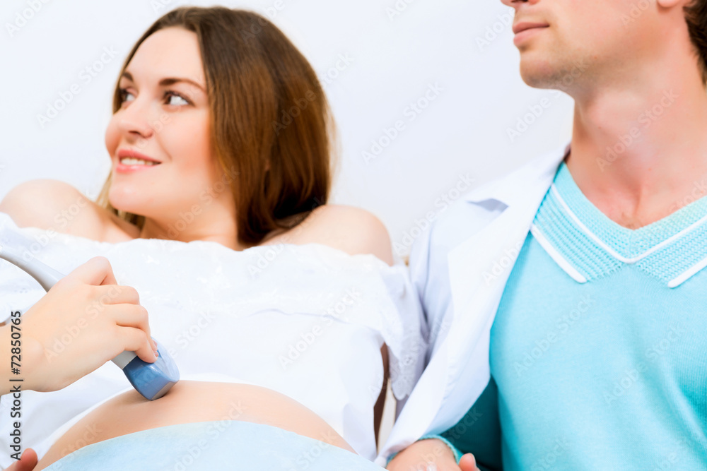 hands and abdominal ultrasound scanner hands and abdominal ultrasound scanner
