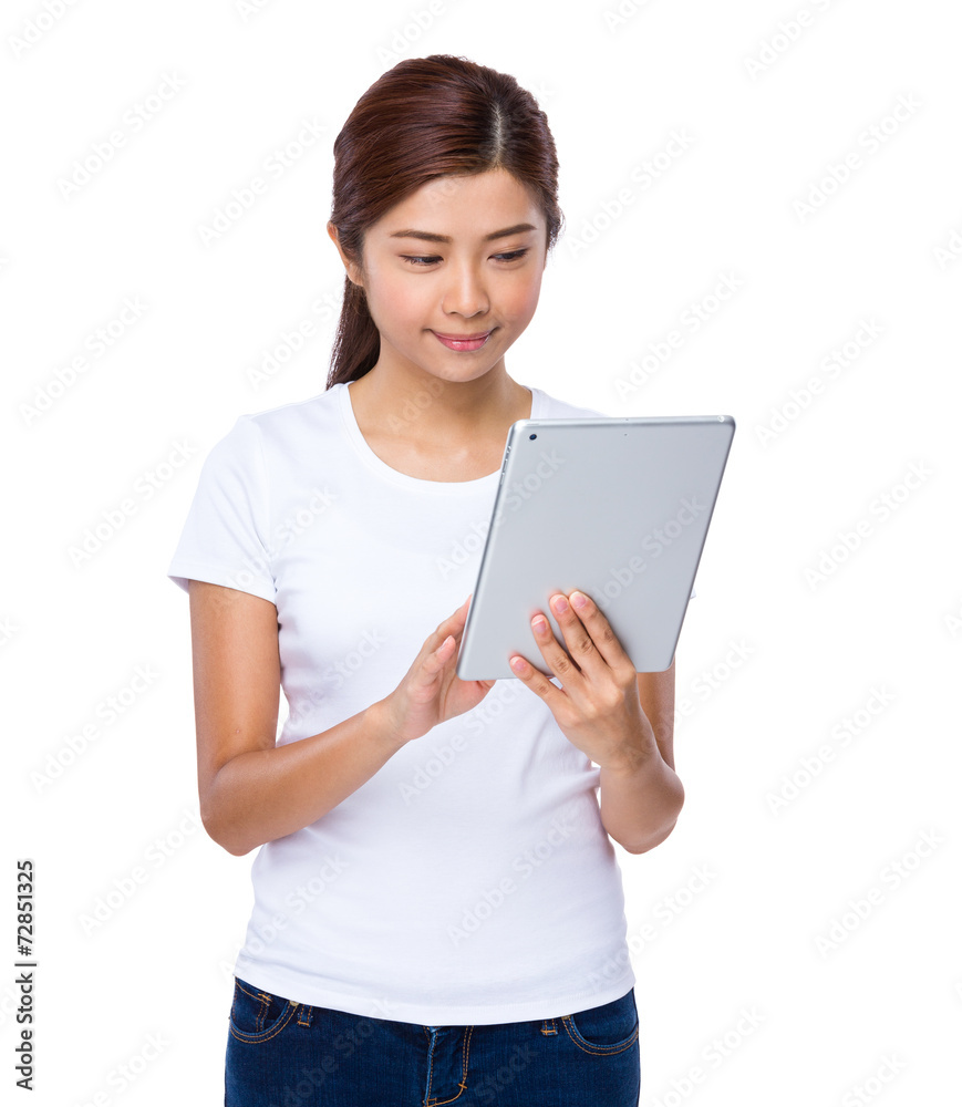 Woman read on digital tablet