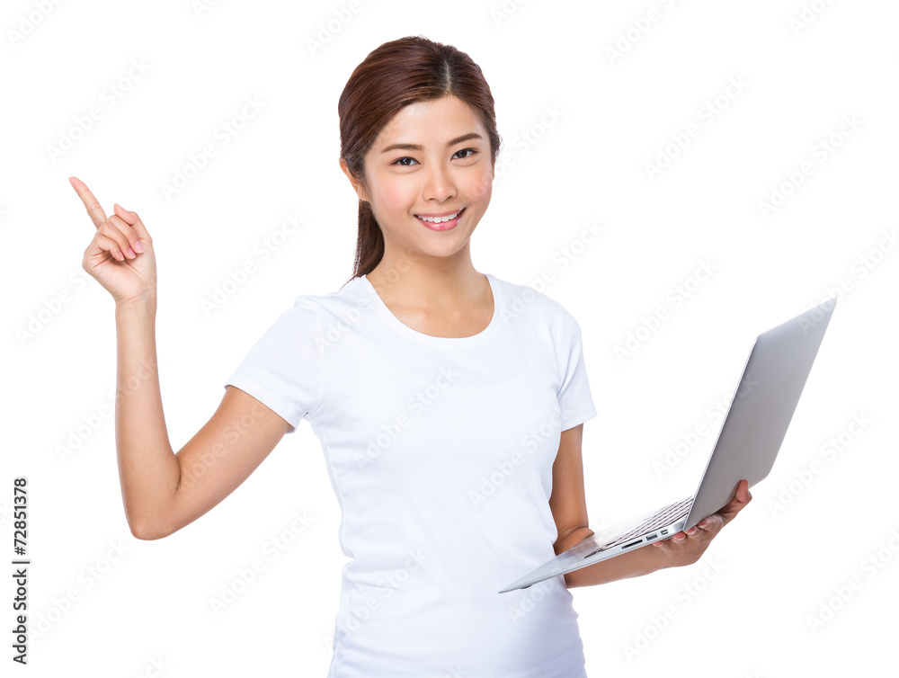 Woman use laptop and finger point up Woman use laptop and finger point up