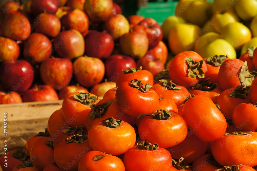 Persimmons fruit at the market in Pakistan Persimmons fruit at the market in Pakistan