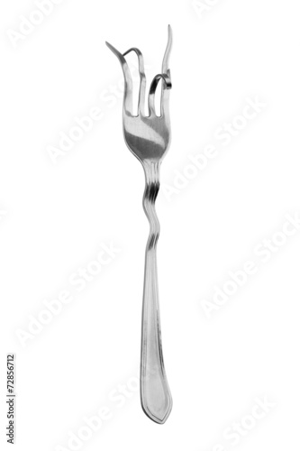 Concept of healthy eating. A broken fork to eat. photo