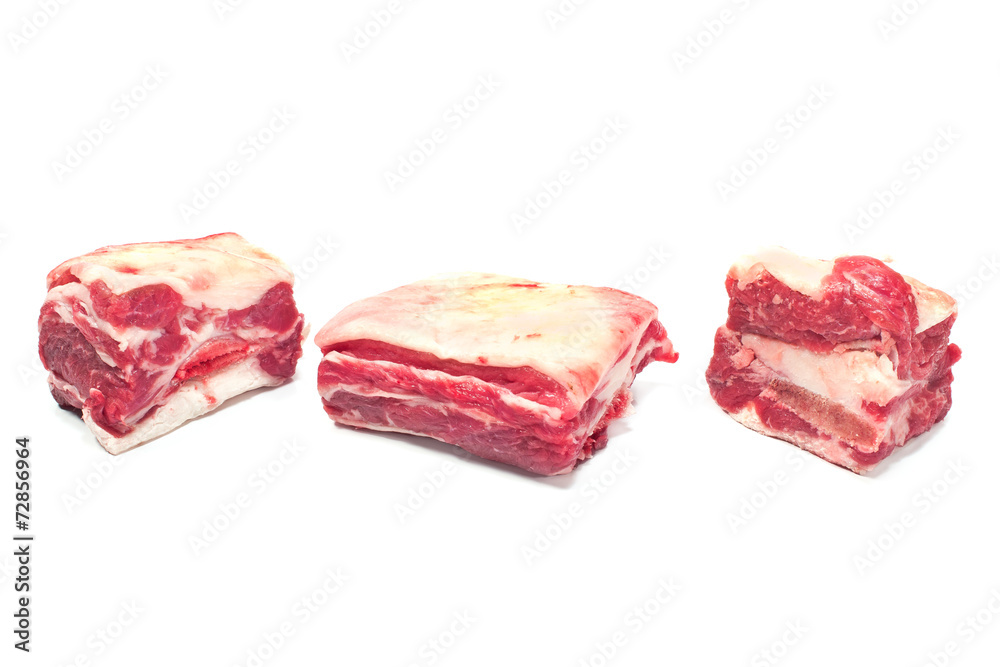 Raw beef ribs on white background