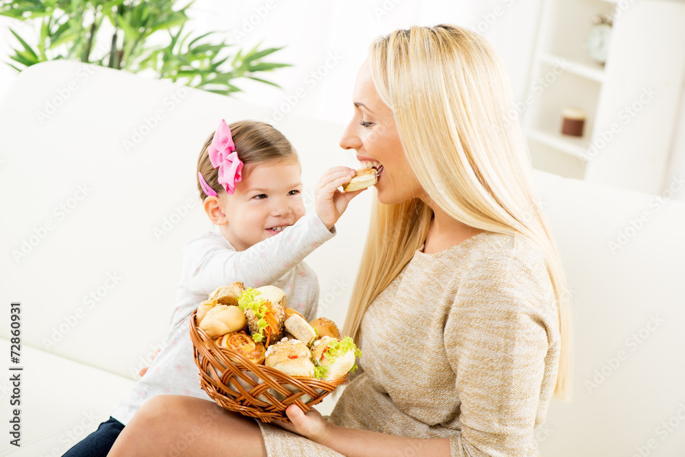 Cute Mom And Daughter With Pastries Cute Mom And Daughter With Pastries