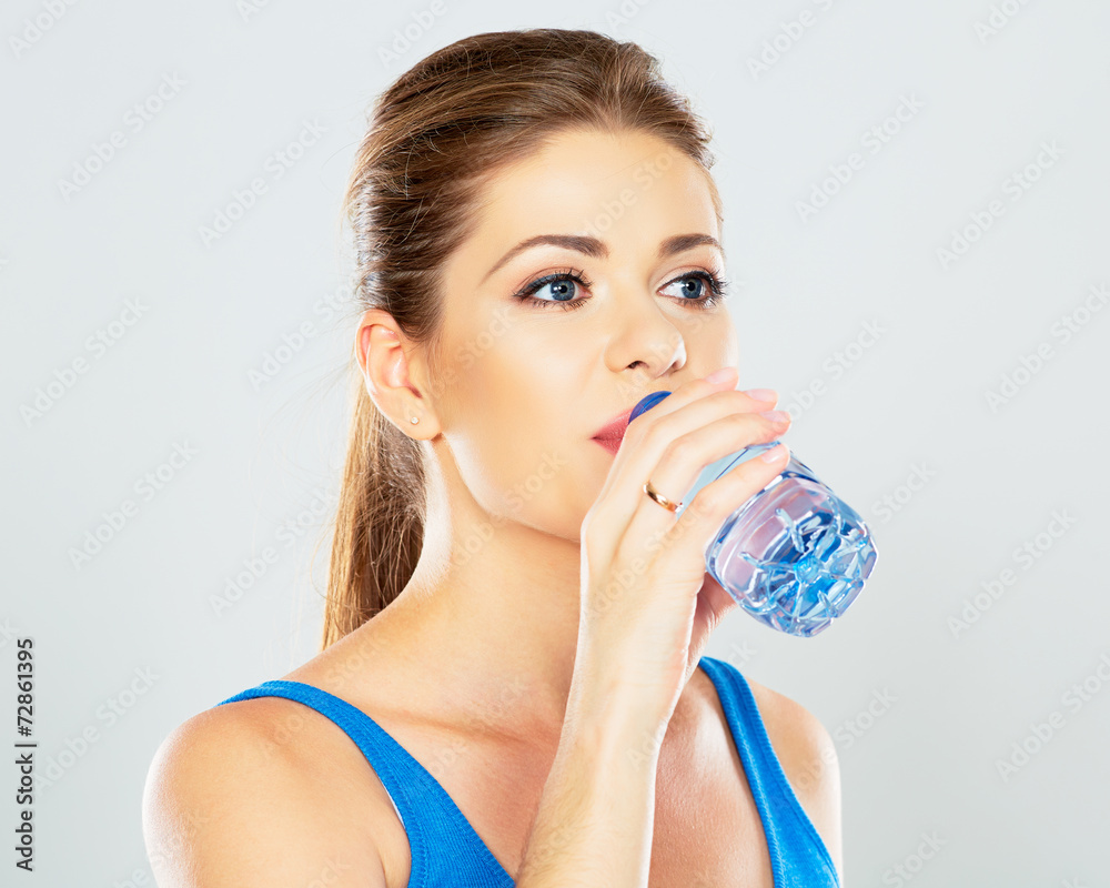 young woman drinking water  profile portrait