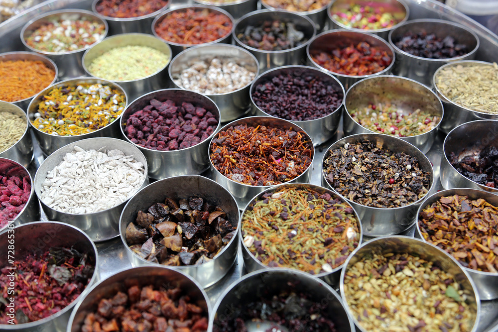 Spices and herbs in bowls on a street market in Kolkata Spices and herbs in bowls on a street market in Kolkata