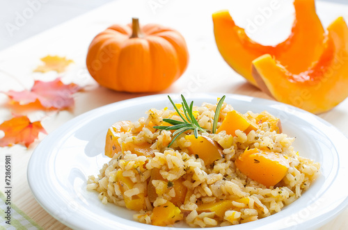 Pumpkin risotto with rosemary for healthy dinner