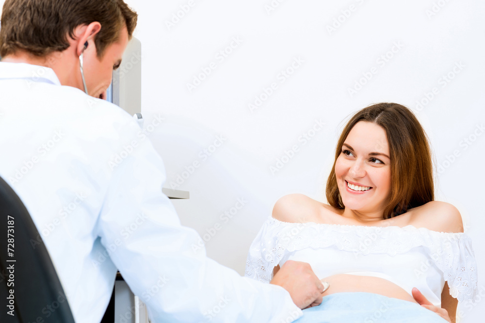 pregnant woman on reception at the doctor