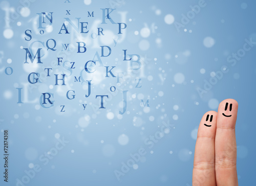 Wallpaper Mural Happy smiley fingers looking at mixture of bokeh letters Torontodigital.ca