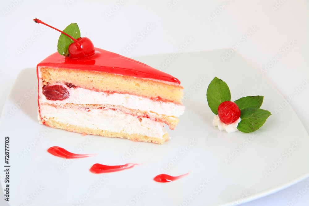 slice of fresh cherries cake with a fresh cherry on top slice of fresh cherries cake with a fresh cherry on top