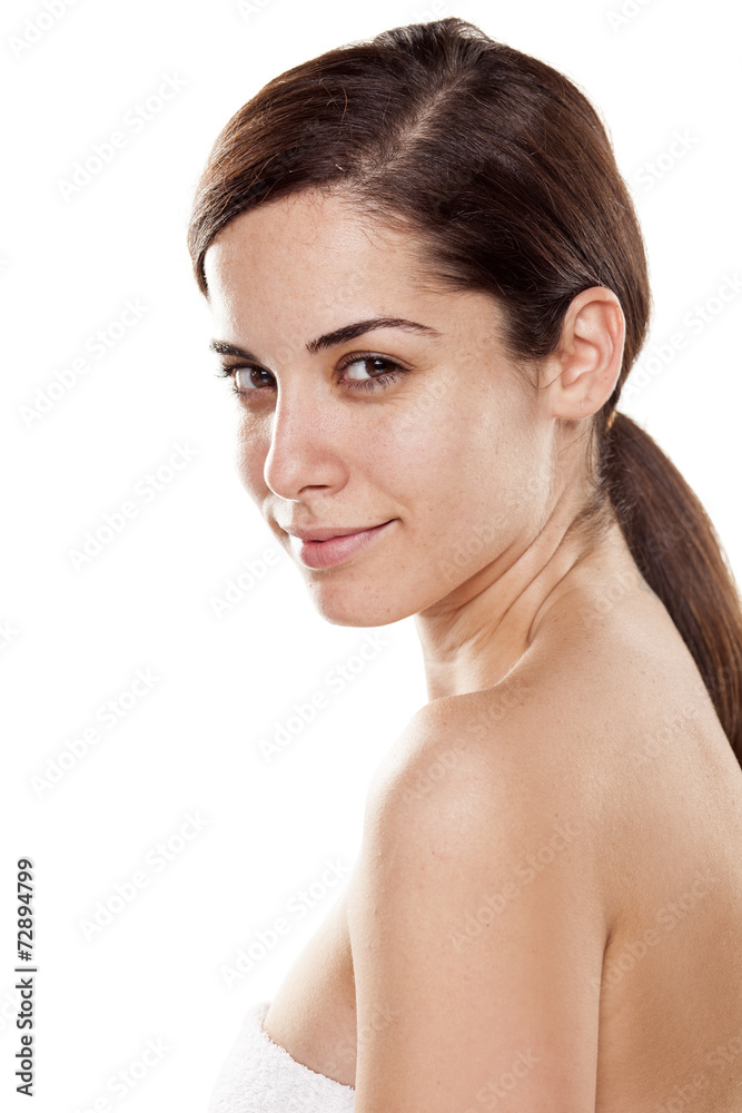 Positive young beautiful woman without make up posing on white Positive young beautiful woman without make up posing on white