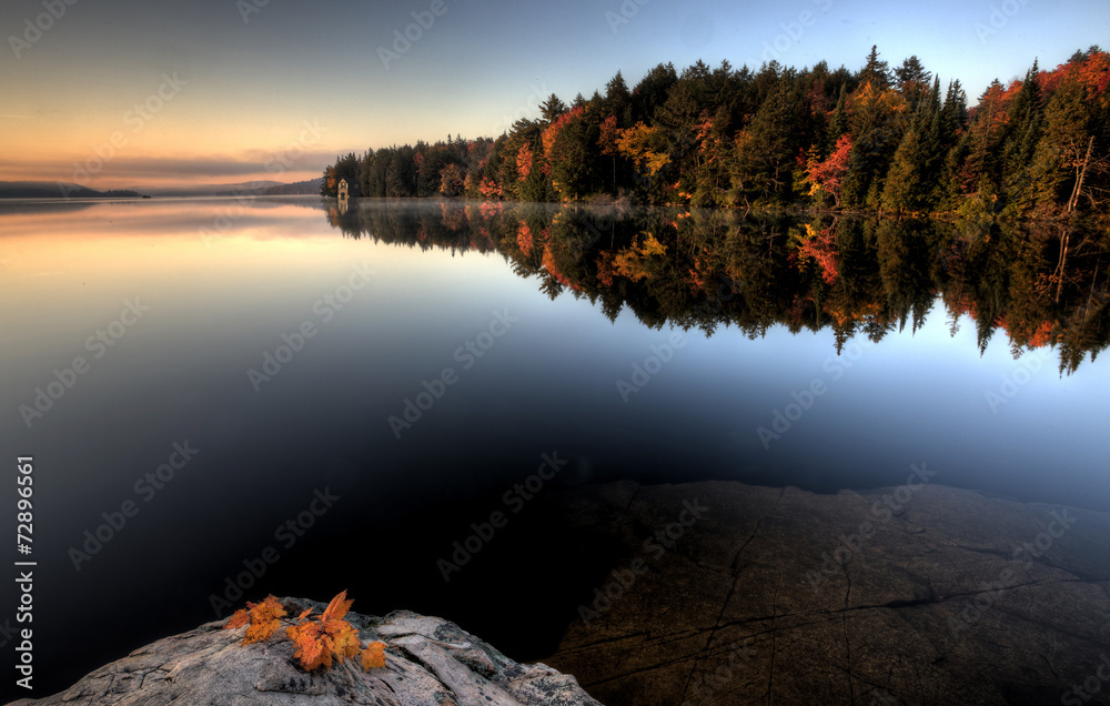 Lake in Autumn sunrise reflection
