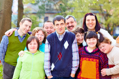 group of happy people with disabilities photo