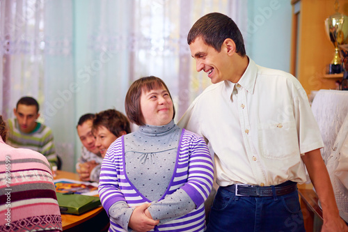happy people with disability in rehabilitation center