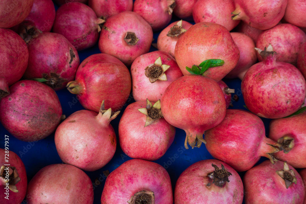 group of pomegranates. pomegranate closeup, background group of pomegranates. pomegranate closeup, background