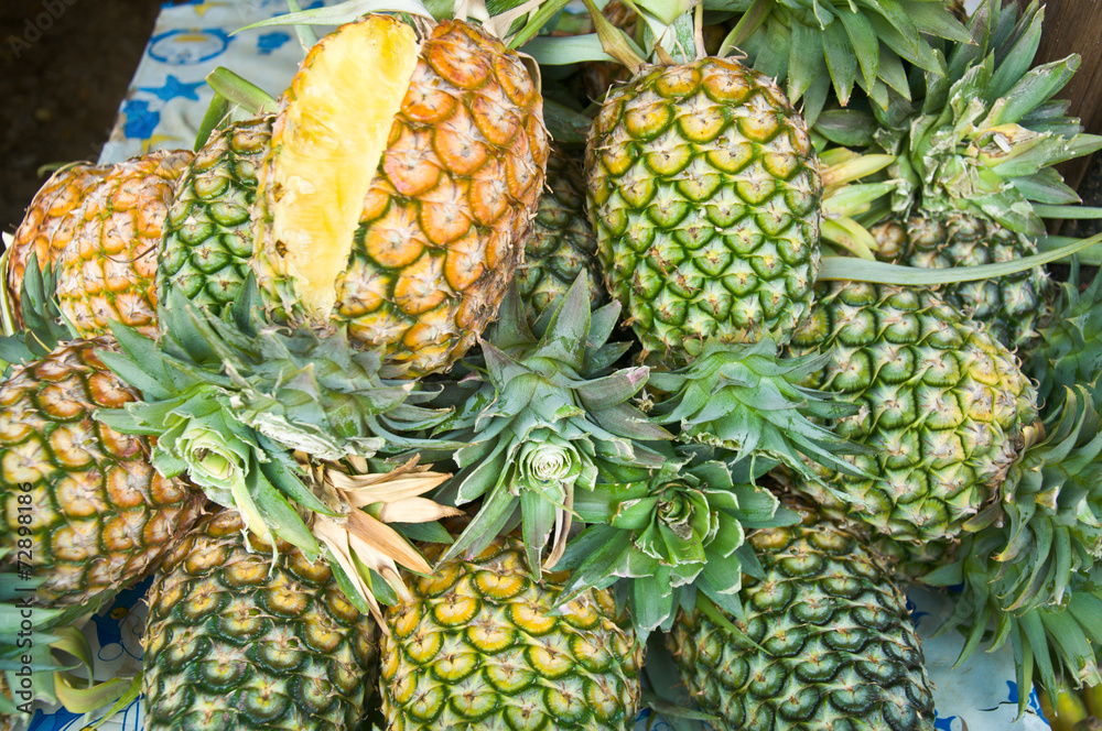 Stack of ripe many pineapples on the market Stack of ripe many pineapples on the market