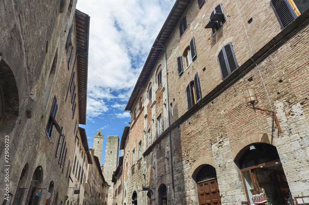 Tower and old street in San Gimignano, Tuscany, Italy