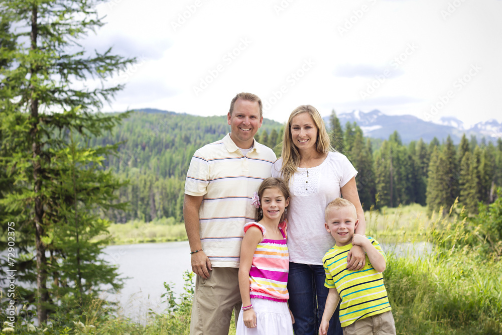 Beautiful Young Family Portrait in the Mountains