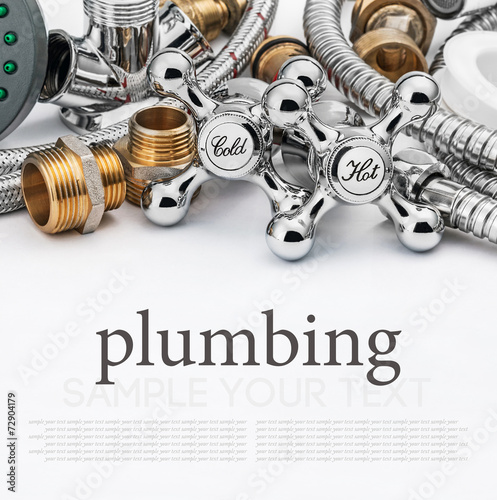 plumbing and tools on a light background