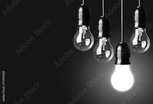 Idea concept on black background photo