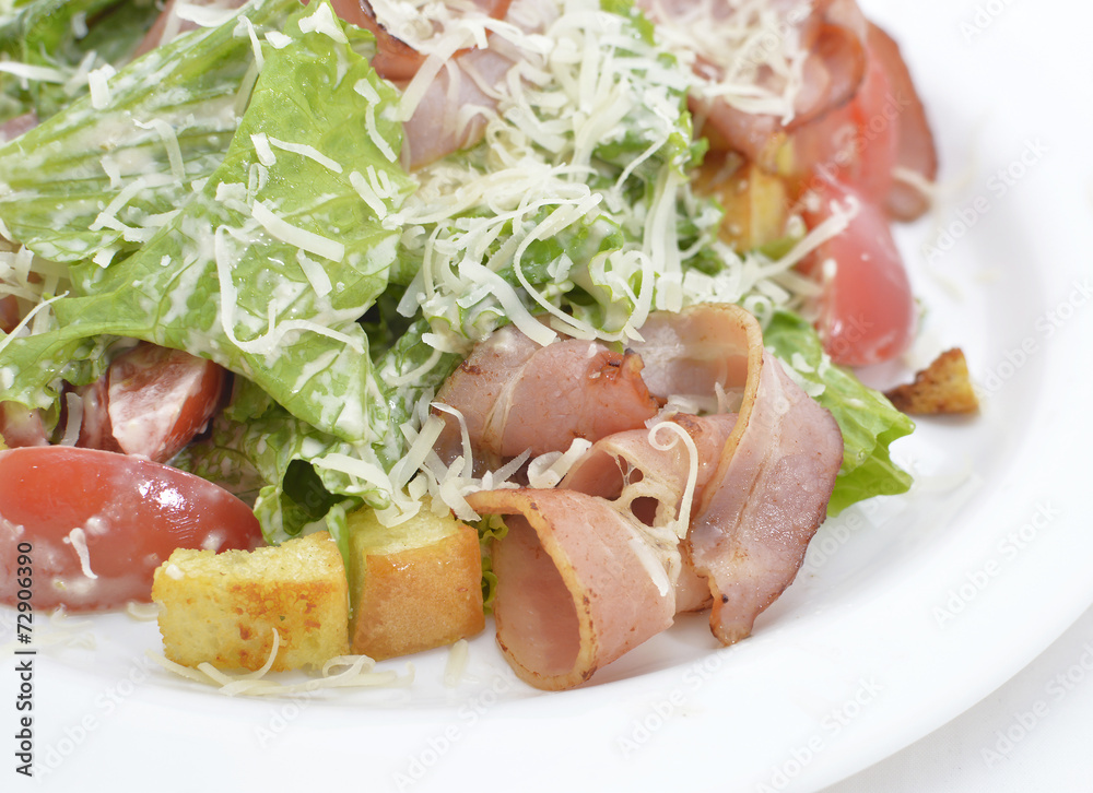 Close up of salad with bacon and vegetables