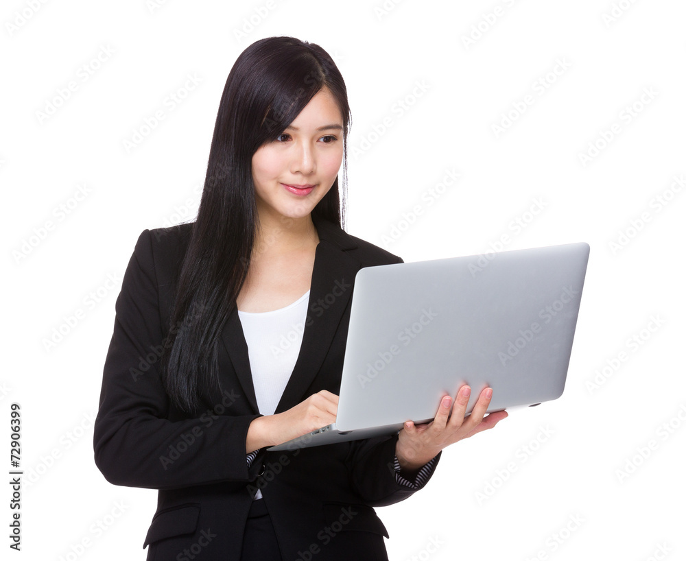 Businesswoman use of notebook computer Businesswoman use of notebook computer